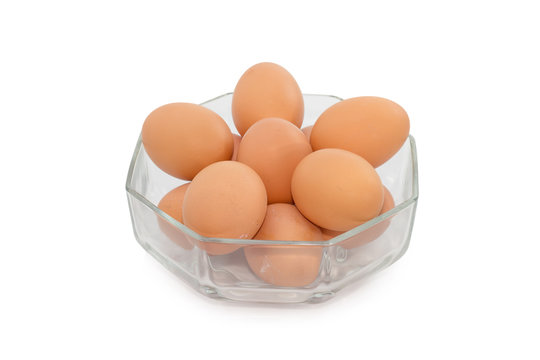 eggs in transparent bowl isolated on white