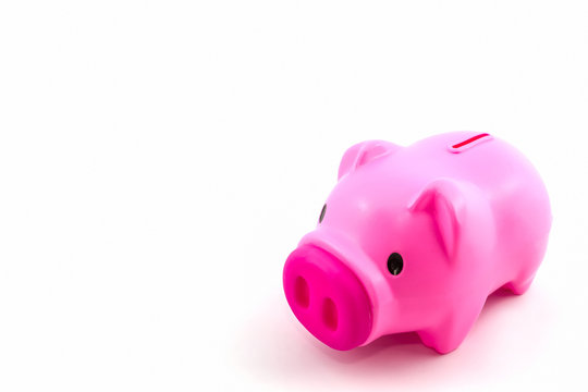 Pink piggy bank saving.