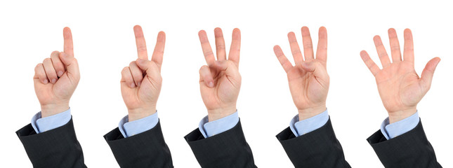 businessman's hand, counts on fingers from one to five