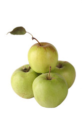 Green apples over white