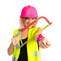 Worker woman cutting his hand working with a saw