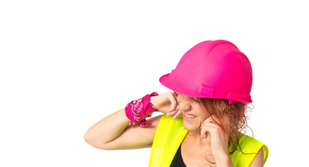 Worker woman covering her ears over white background