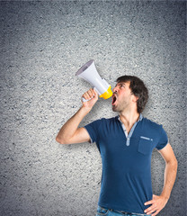 Man shouting over textured background