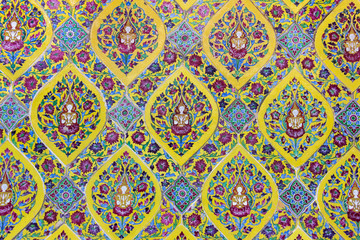 ancient ceramic tile decorated with Thai art