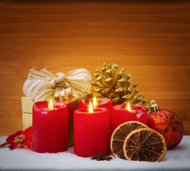 Fototapeta na wymiar Christmas background with four candles.