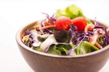 Close up wooden salad bolw