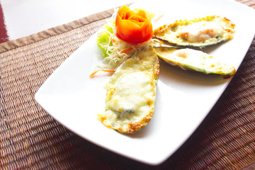 mussel shells with cheese