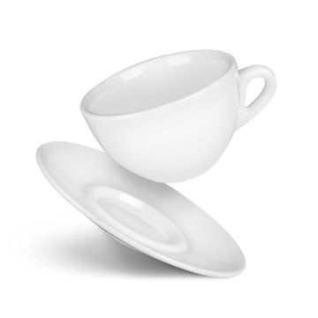 Falling Coffee Cup And Saucer On The Isolated White Background