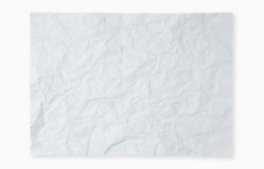 Crumpled white paper on white background
