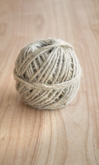 ball of twine on old wooden table