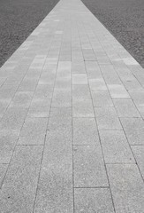 Pavement on  gray cobblestone  road