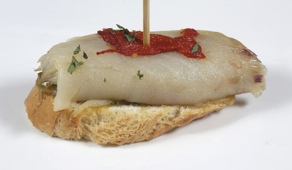 Roasted cod fillet stuffed with serrano ham