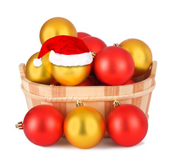 Christmas ball in the hat of Santa Claus  on the white isolated