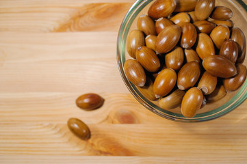 acorns on a wooden board