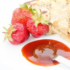 Square view of pancakes and strawberries