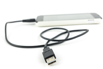 micro usb cable connected to smart phone