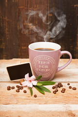 Becher Kaffee mit dampfendem Herz