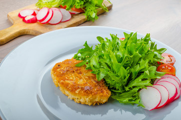 Breaded pork chops in Parmesan cheese