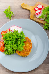 Breaded pork chops in Parmesan cheese