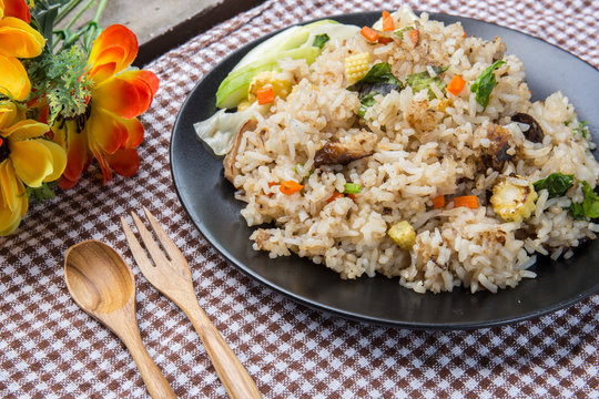 Vegetarian stir-fried rice and spoon