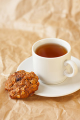light breakfast: a cup of tea and diet oatmeal cookies