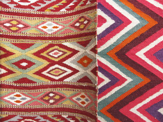 Colourful rug background divided into two sections