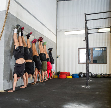 People Doing Handstands At Cross Training Box