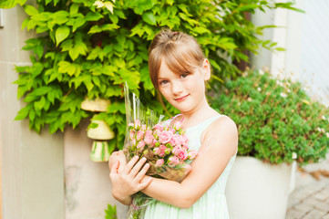 Outdoor portrait of a cute little girl