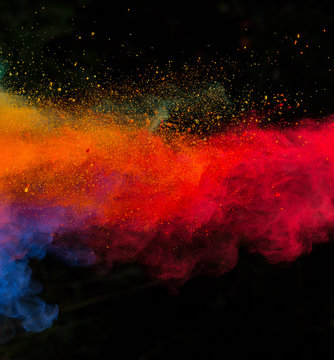 launched colorful powder over black © Lukas Gojda