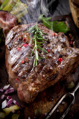 Beef steak on wooden table
