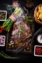 Beef steak on wooden table