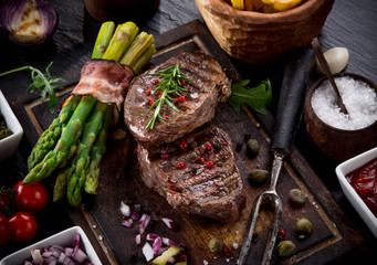 Beef steak on wooden table