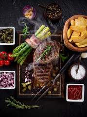 Beef steak on wooden table