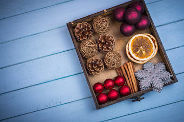 Retro wooden box with Christmas decorations