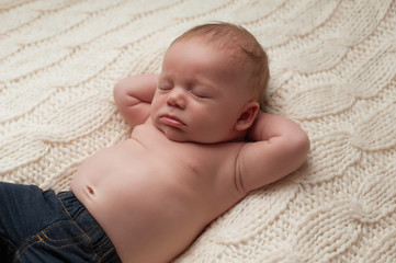 Sleeping Baby Boy Wearing Jeans