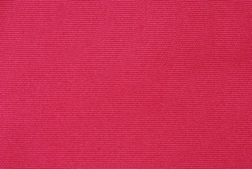 Pink canvas fabric texture.