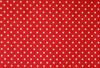 Polka dot on red canvas cotton texture, fabric background