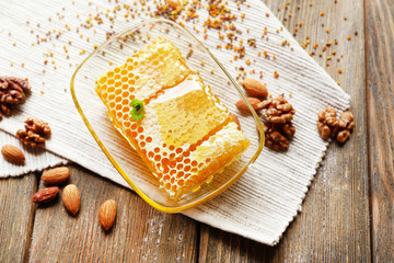 Fresh honey on wooden table