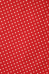 Polka dot on red canvas cotton texture, fabric background