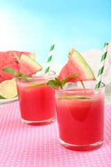 Watermelon cocktails on table, close-up