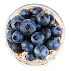 Healthy breakfast - yogurt with  blueberries and muesli served