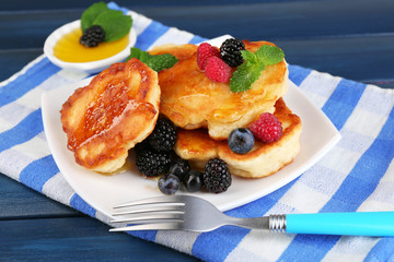 Tasty pancake with fresh berries and mint leaf