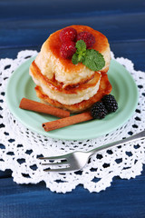 Tasty pancakes with fresh berries and mint leaf