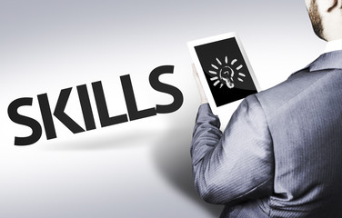 Business man with the text Skills in a concept image