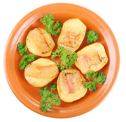 Baked potato with bacon on plate, isolated on white