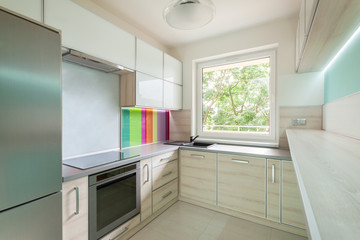 Fototapeta na wymiar Bright kitchen with colorful decoration