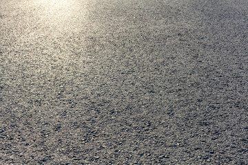 close-up horizontal view of new asphalt road