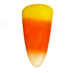 Halloween candy corn isolated. Closeup
