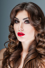 Fototapeta premium beautiful brunette with gorgeous curly hair