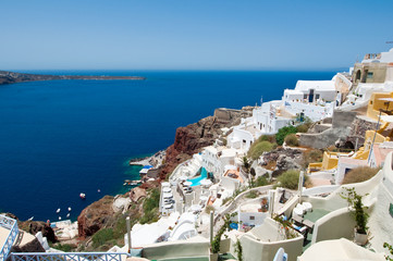 Oia village and Port of Ammoudi below.Thira, Greece.